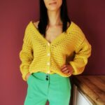 Dzianinowy sweter ażurowy żółty